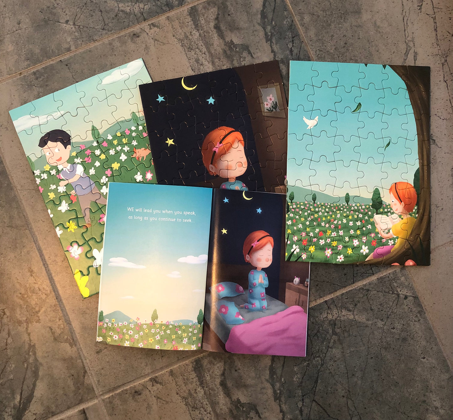 Colorful storytelling themed jigsaw puzzle featuring children in a whimsical landscape