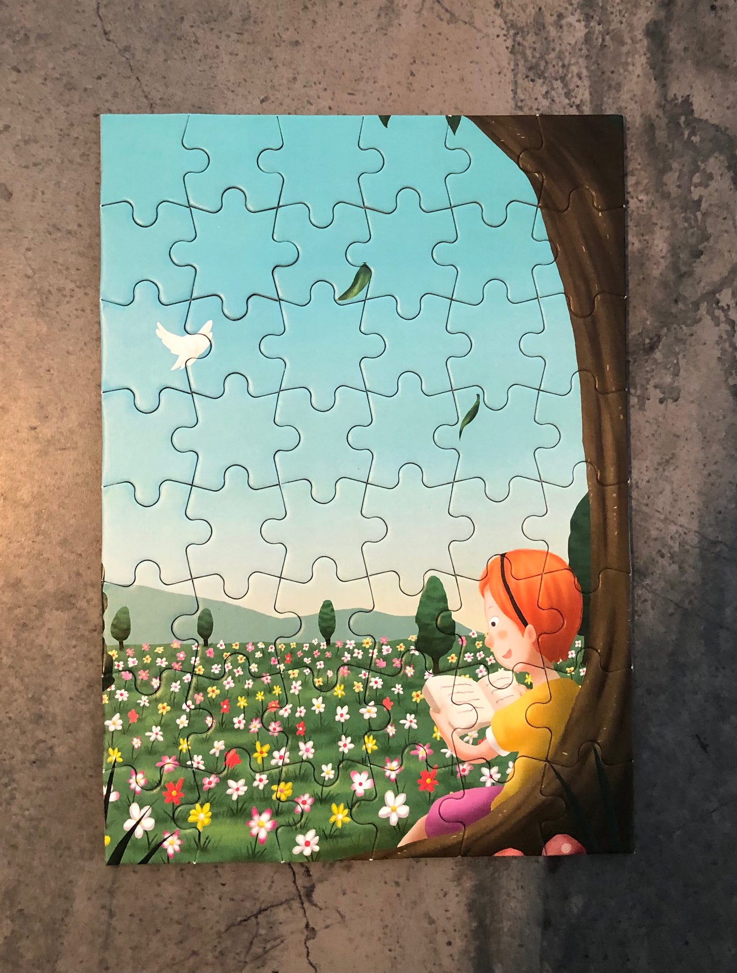 Colorful illustration of a child reading in nature, ideal for a Christian children's book bundle